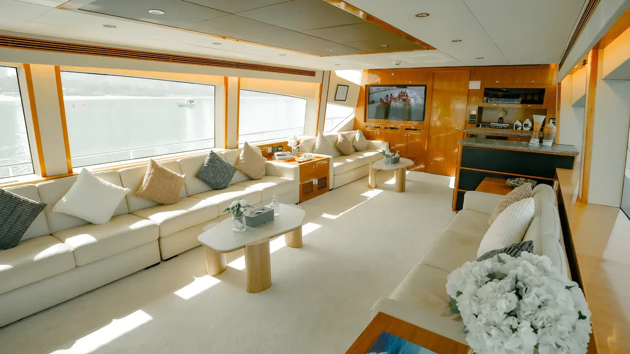 Sunlit saloon and lounge seating aboard Xclusive 42