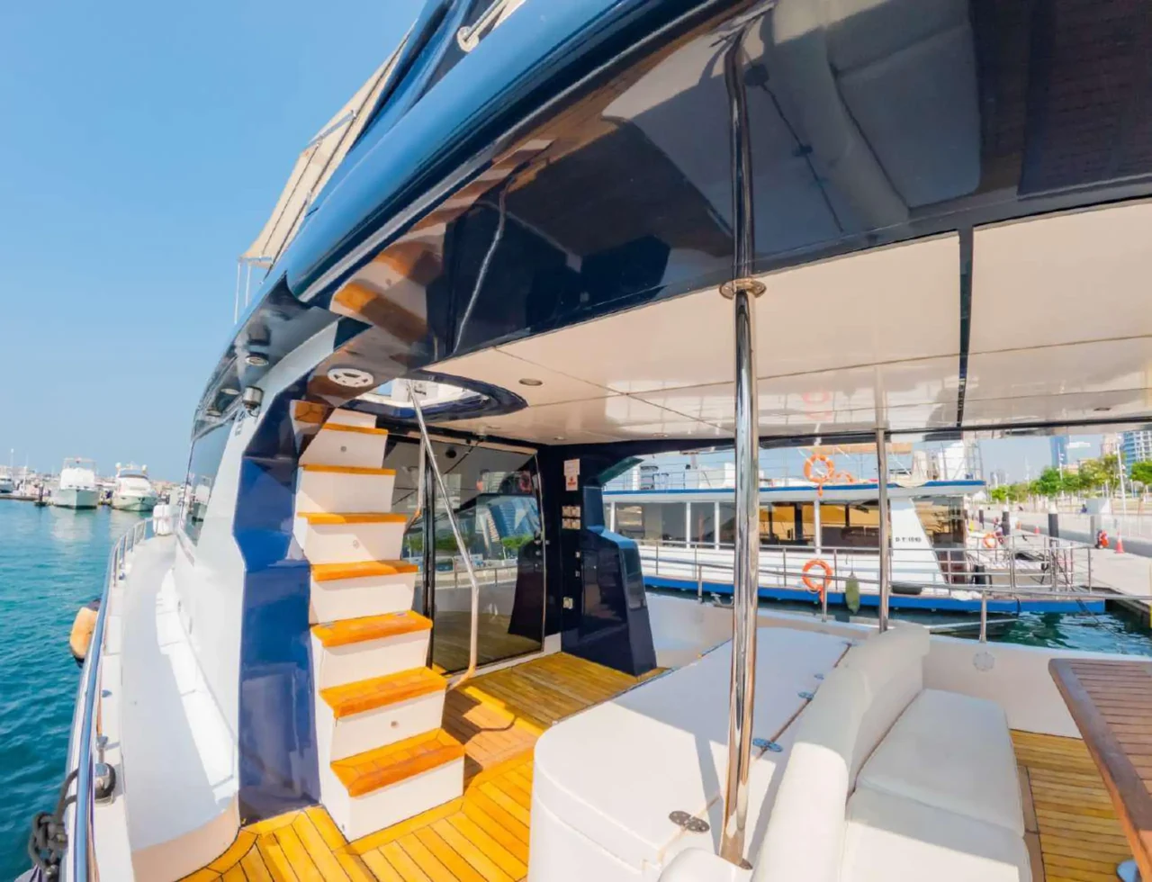 Aft deck seating and stairs to the upper deck aboard Hamdan 65