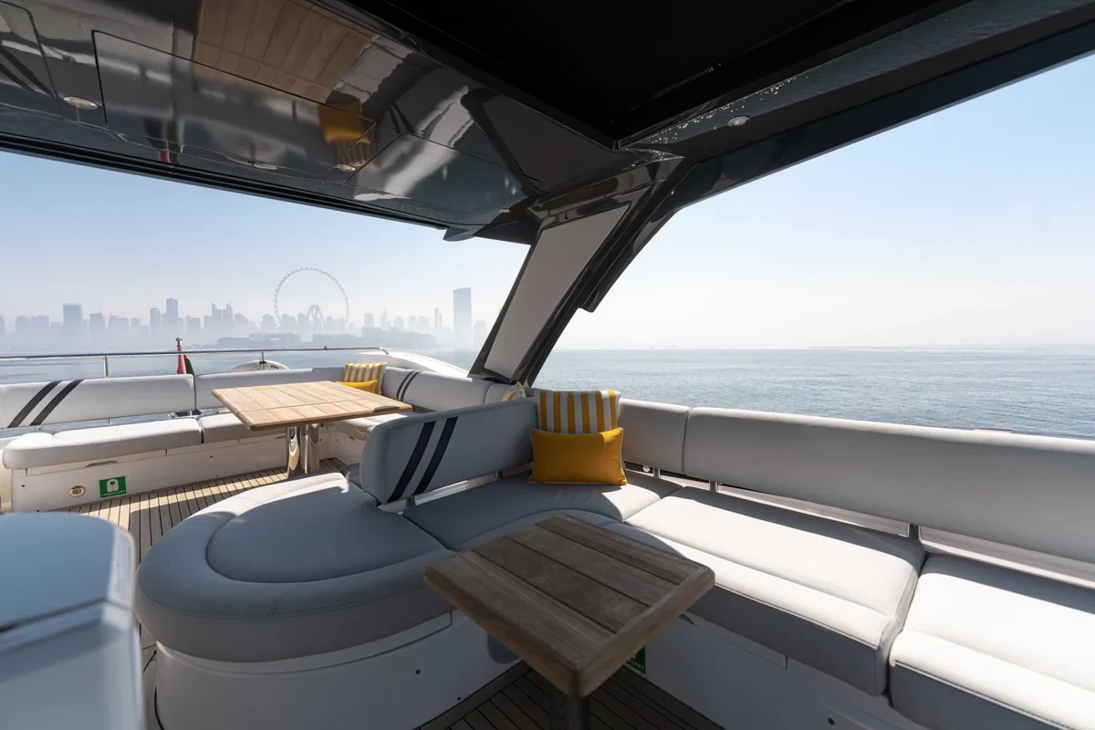 Covered outdoor lounge seating aboard My Serenity