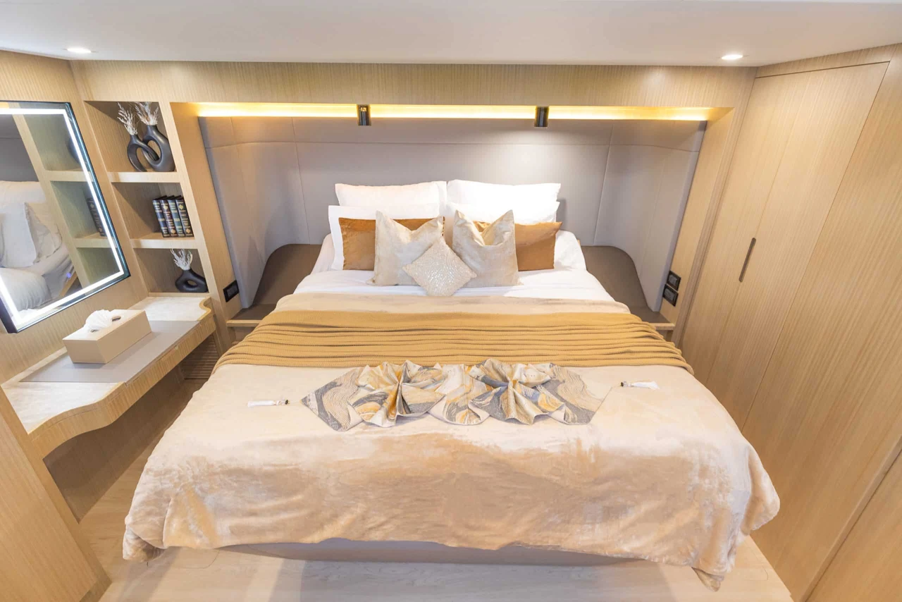 Double cabin with pale wood cabinetry aboard Zirve 72