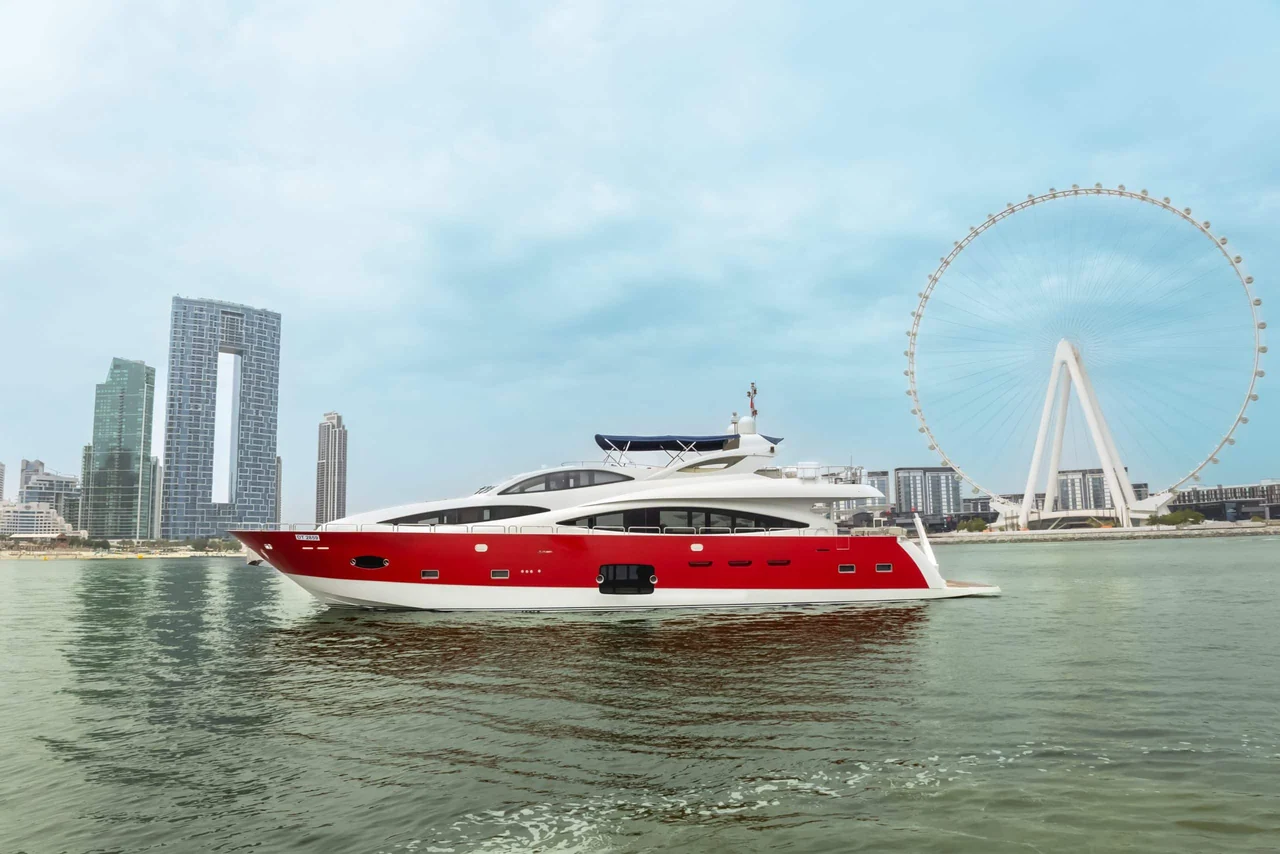Red-hulled Asya 110 on the water near Ain Dubai