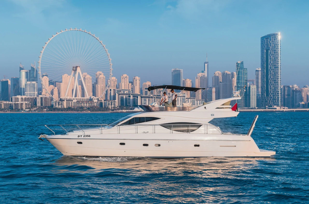 Elise 50 cruising past the Ain Dubai skyline
