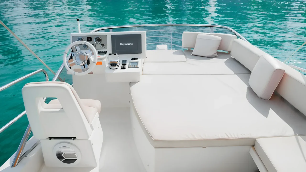 Flybridge helm and sun mattress on Xclusive 33