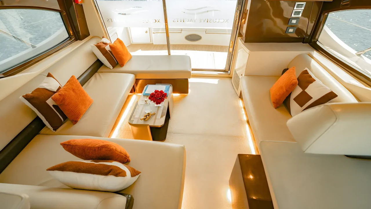 Warmly lit interior lounge of Xclusive 7