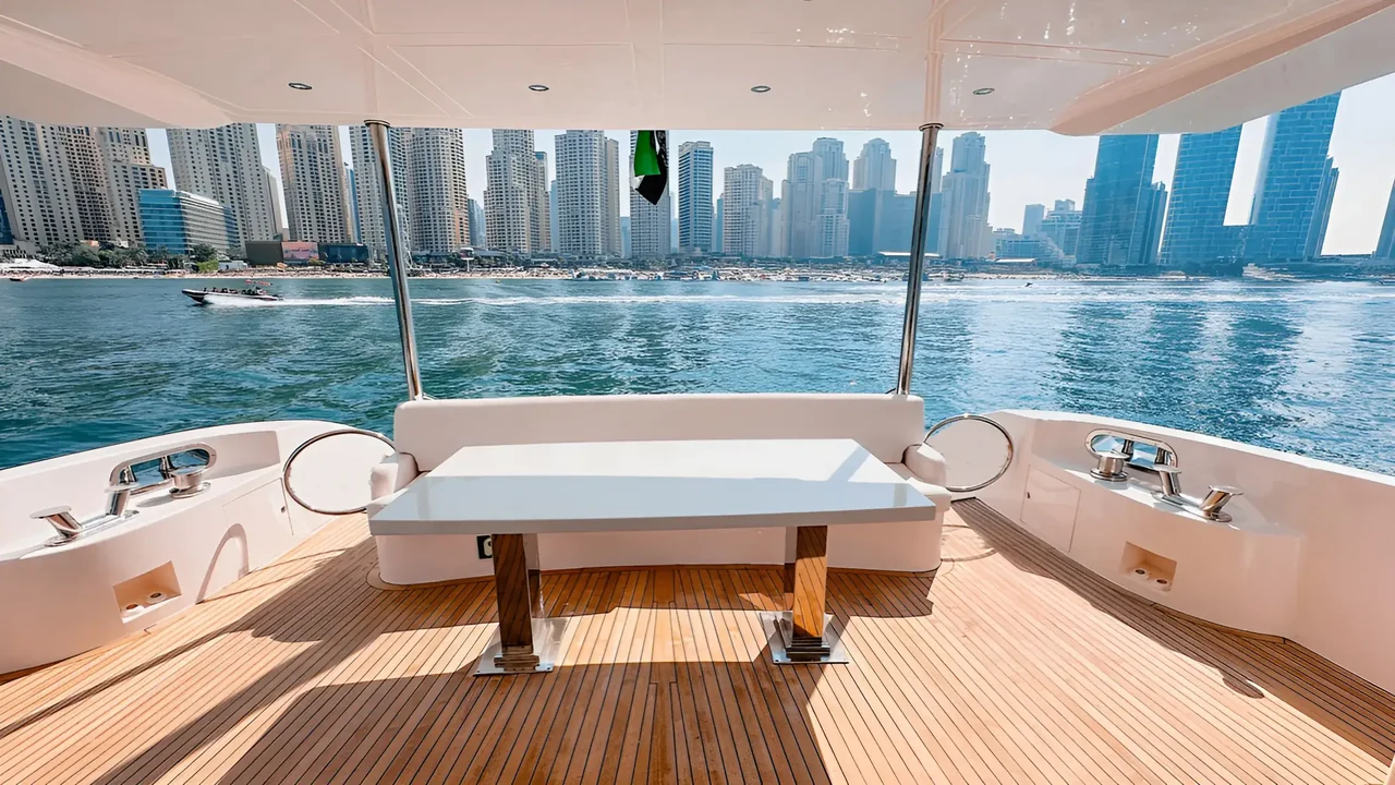 Aft deck dining table aboard Xclusive 34