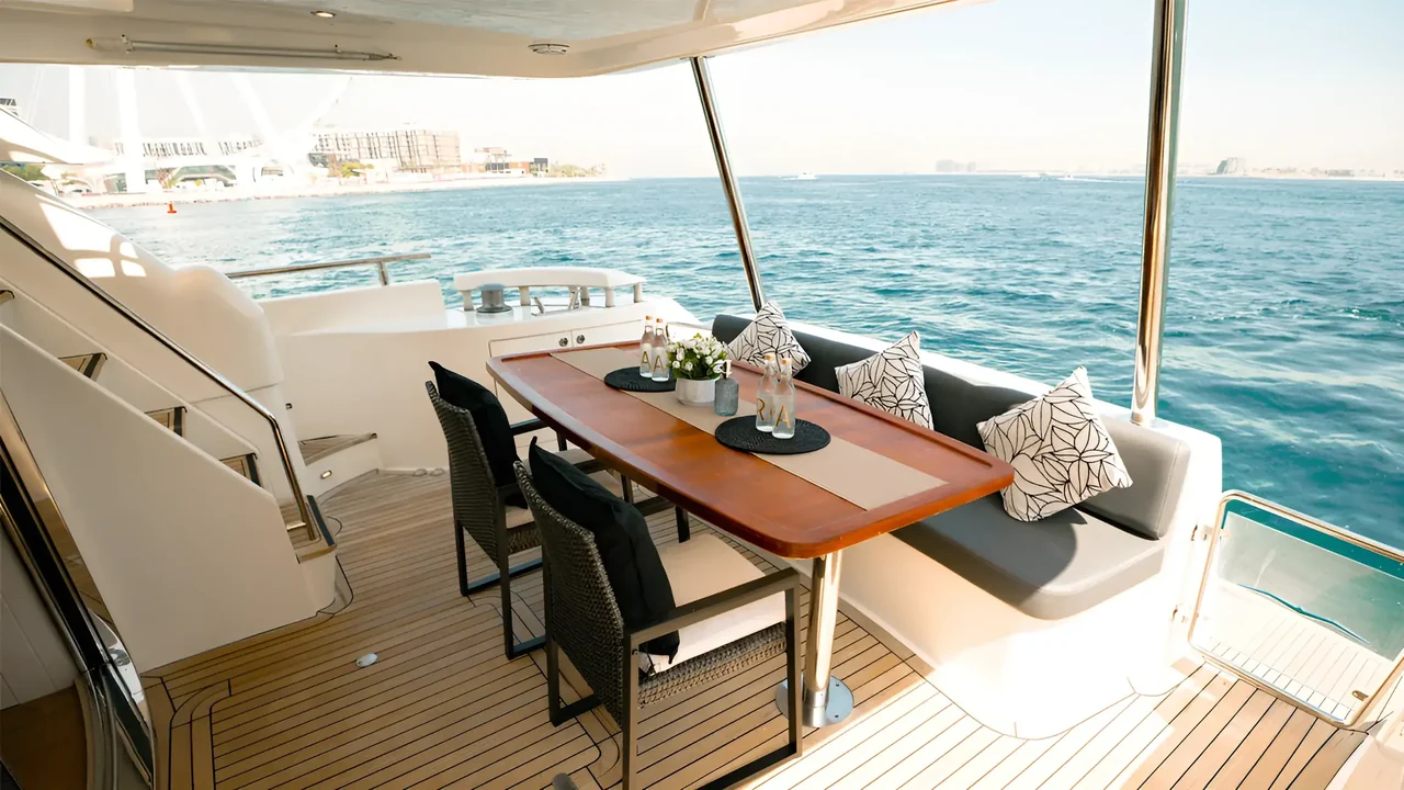Shaded aft dining table on Xclusive 40