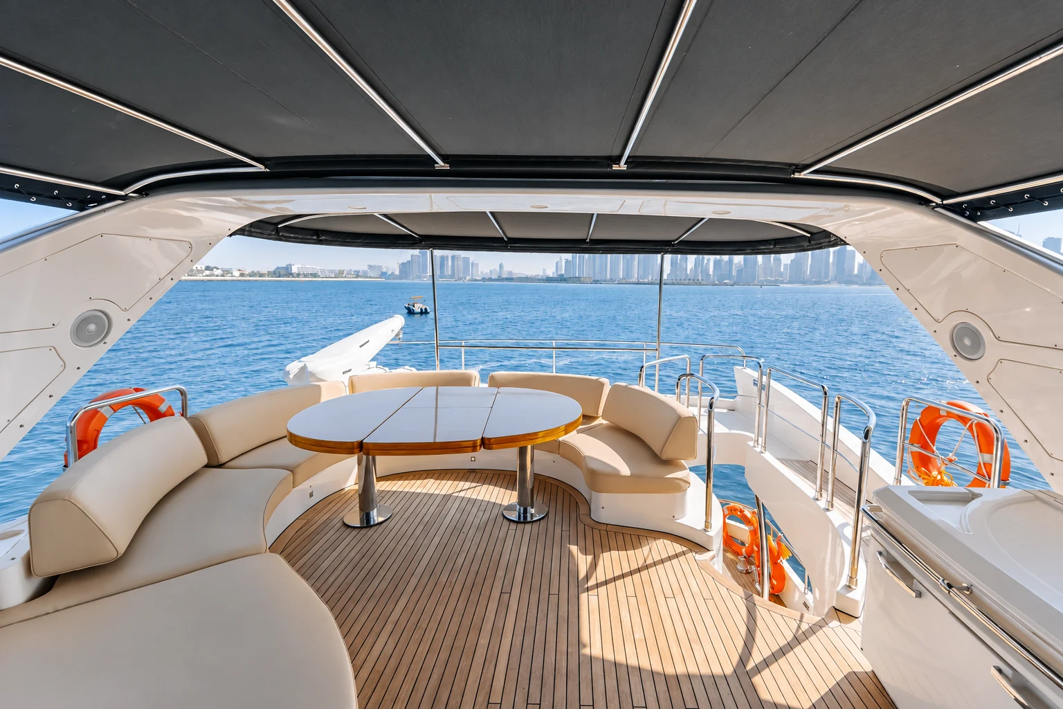 Outdoor dining area on Azimut 79 luxury yacht charter in Abu Dhabi marina