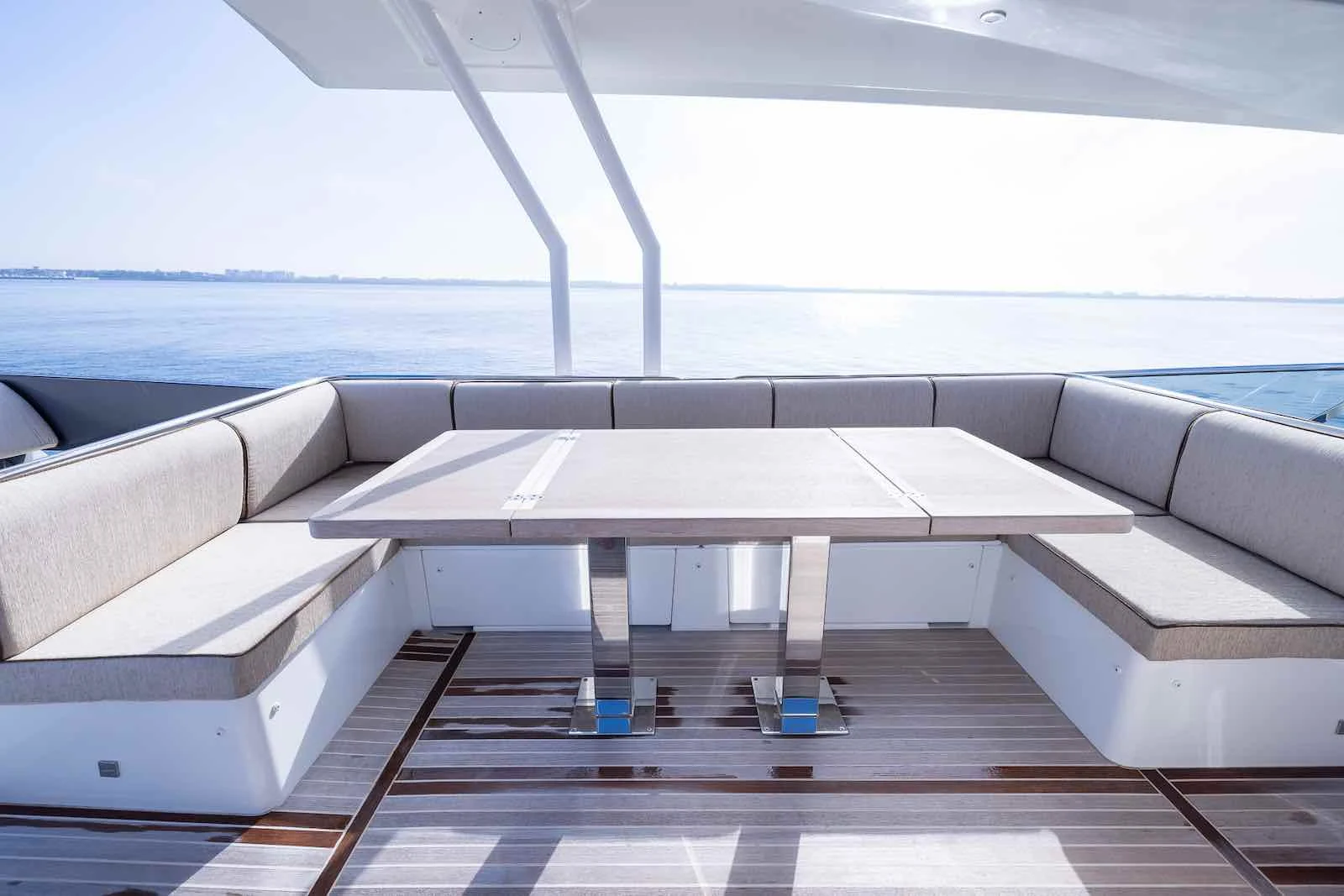 Monaco 60 yacht interior salon with modern sofa and panoramic windows