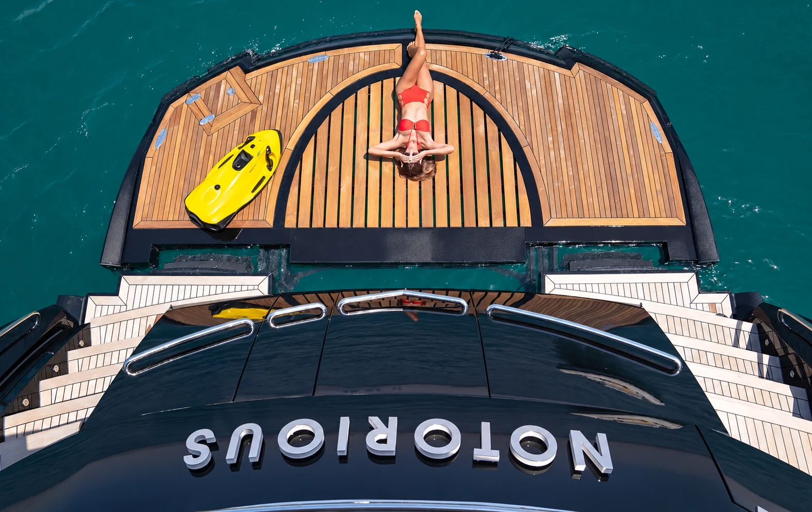 Aerial view of Notorious yacht stern deck with water toys